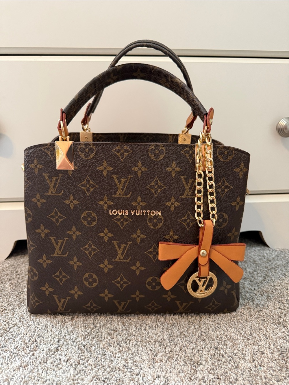 Louis Vuitton Monogram Canvas Satchel in Brown with Tan Accent Charm